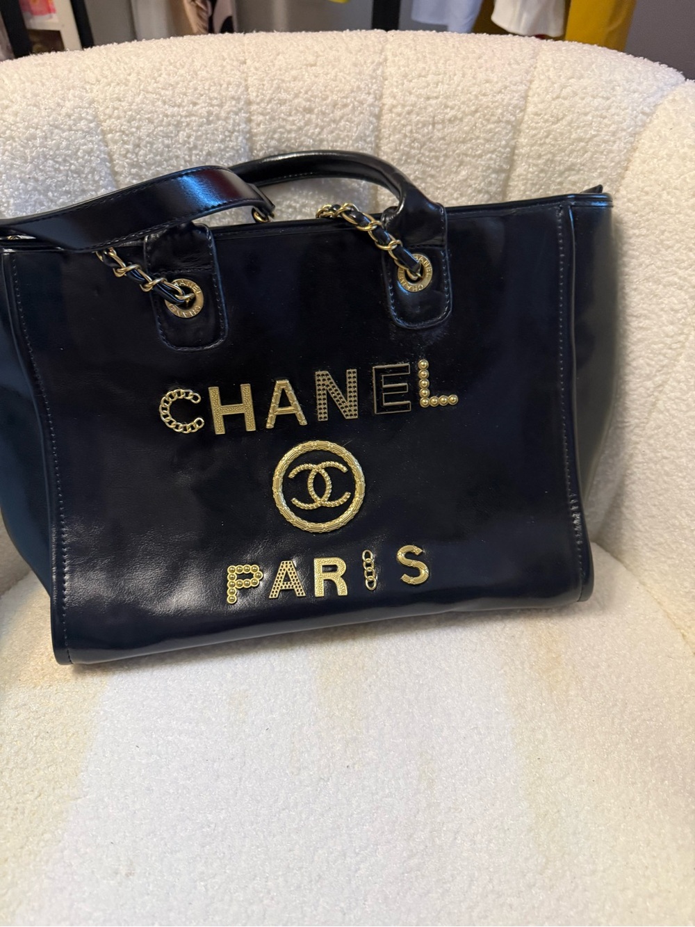 CHANEL Black Leather Tote with Gold Logo Accents
